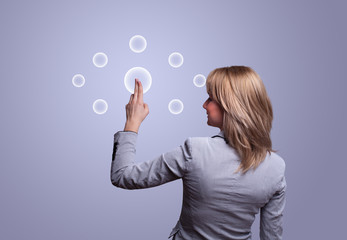 hand pressing digital buttons