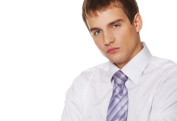 Young businessman isolated on white