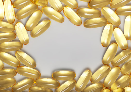 Gold border capsules on gray