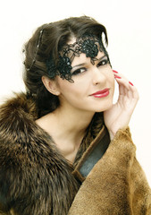 portrait of a beautiful woman in the fur coat