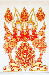 Angel on temple wall in Thailand.