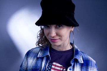 Sly girl in black hat.