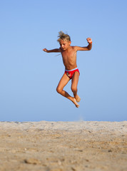 Obraz premium The boy jumps