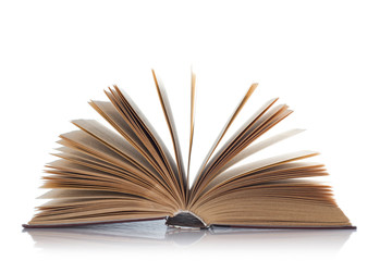 Open old book on white background. Isolated.