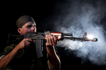 Fototapeta na wymiar Soldier with rifle