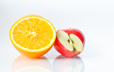 Food Related: Apples and Orange Isolated on a White Background