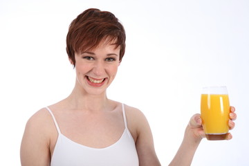 Healthy happy woman holding glass of orange juice