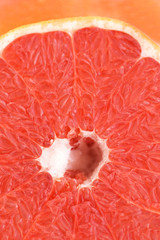 Ripe and juicy grapefruit (pomelo) in a closeup