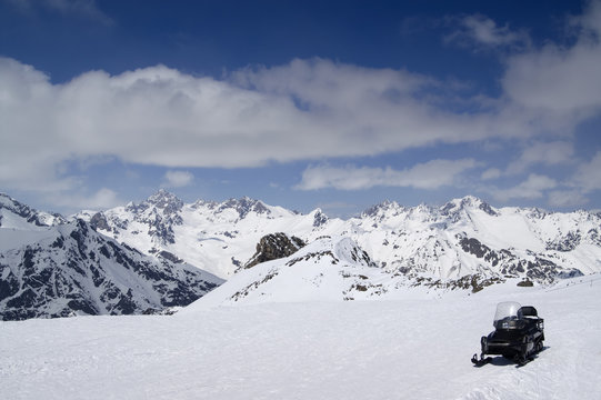 Snowmobile on ski slope