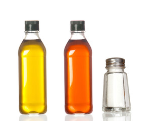 Bottles of oil, vinegar and salt boat