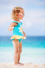 Toddler girl at beach