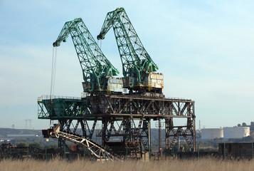 Fototapeta na wymiar Cranes and scrapyard