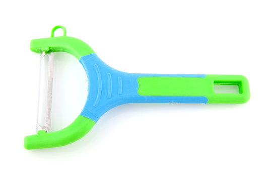 colorful popato peeling knife over white background