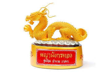 Golden dragon statue isolated