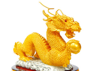 Golden dragon statue isolated