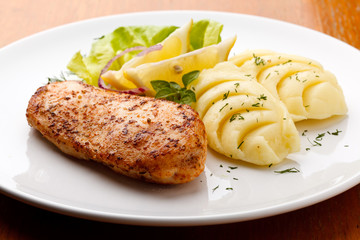 Roasted chicken breast  and mashed potatoes