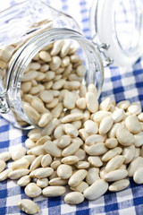 white beans in glass jar