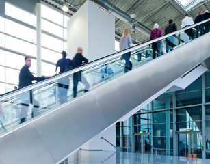 trade fair staircase with blurred people