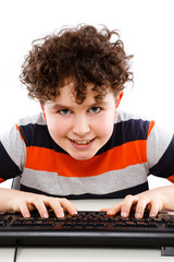 Boy using computer isolated on white background