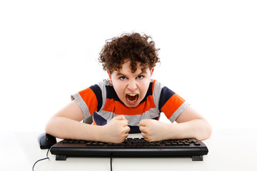 Boy using computer isolated on white background