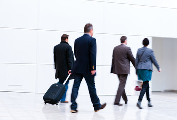 blurred trade fair visitors