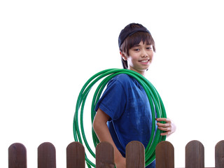 child with a water hose