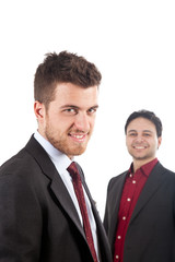 Two confident smiling businessmen isolated on white