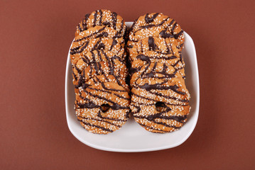 Cookies with glaze on a plate