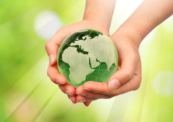 Hand holding the Earth