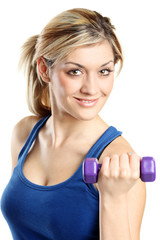 Close up of a young attractive woman with weights