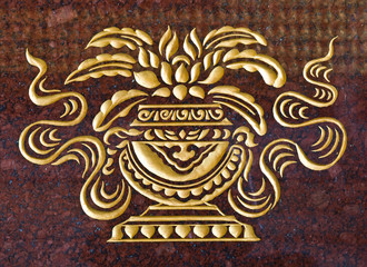marble carve  gold paint  in temple wall