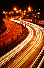 beautiful light trail at the busy highway