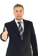 Business man gives thumbs