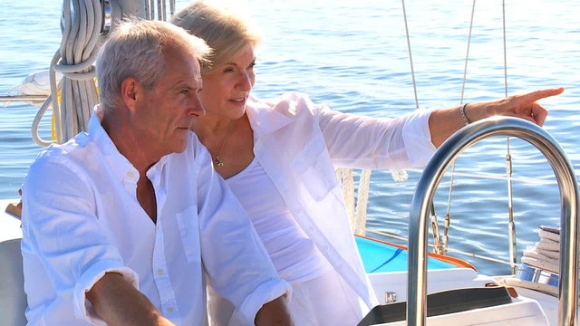 Seniors Sailing Their Luxury Yacht filmed at 60FPS