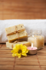 Obraz na płótnie Canvas Peeling Cream, Candle and Natural Soap