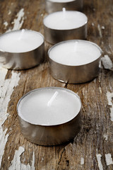 round candle  on wood