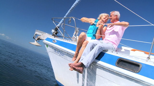 Happy Senior Couple Aboard Luxury Yacht filmed at 60FPS