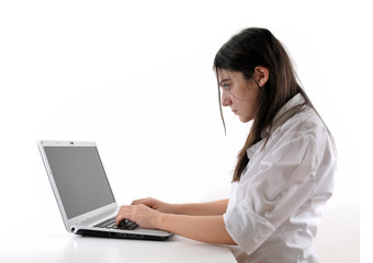 Teenager working on computer isolated on white background.
