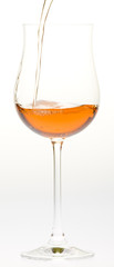 wineglass with rose wine