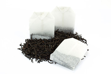 Tea bags and dried tea leaves
