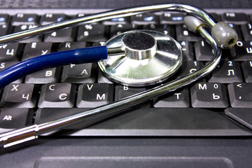 Stethoscope on the notebook's keyboard