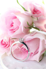 Diamond ring and pink rose