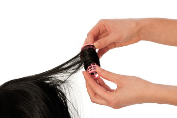 hairdresser makes curls