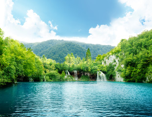 lake in deep forest © Iakov Kalinin