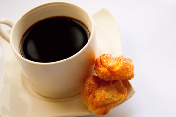 A cup of coffee and bakery