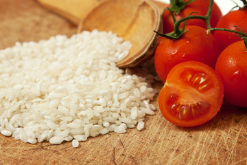 rice and cherry on wooden board