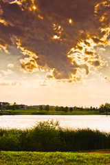 Summer Evening Skies Over The Lake