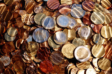 euro coins under water