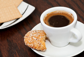 Cup of coffee with biscuits