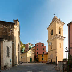 Fototapeta na wymiar Church in small town in mountains, Italy